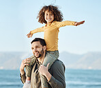 Dad, child and piggyback, freedom at beach with bonding and kid on shoulders, fun and games together. Man, young girl and playful, summer and smile with love and adventure, parenting and childhood