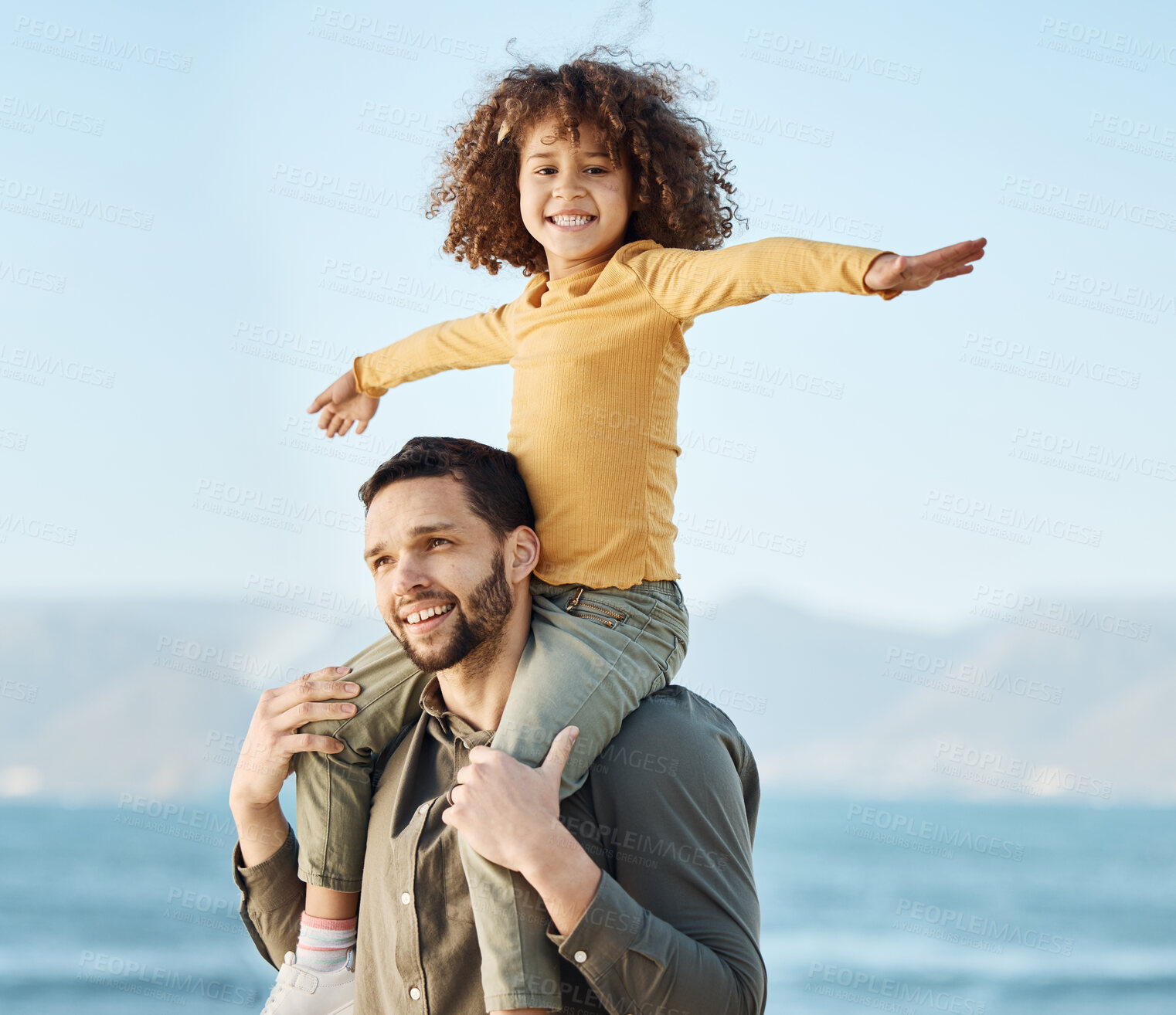 Buy stock photo Dad, child and piggyback, freedom at beach with bonding and kid on shoulders, fun and games together. Man, young girl and playful, summer and smile with love and adventure, parenting and childhood