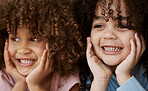 Smile, closeup and hands on face of girl children and curly hair looking sweet and adorable for kids promo. Happiness, people and teeth emoji with zoom and excitement in bedroom at family home