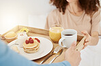 Breakfast on tray, morning and couple in bed for birthday, anniversary celebration and romantic gesture. Relationship, love and happy couple with healthy food for wellness, nutrition and surprise