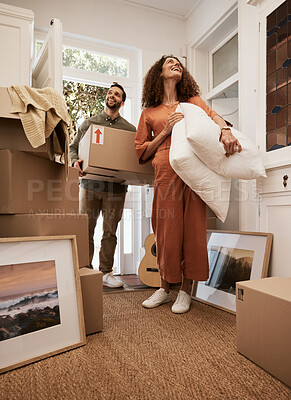 Buy stock photo Real estate, success and couple smile in a living room for moving, dream and home, relocation or mortgage. Property, investment and happy man with woman in new house with box, furniture and excited 