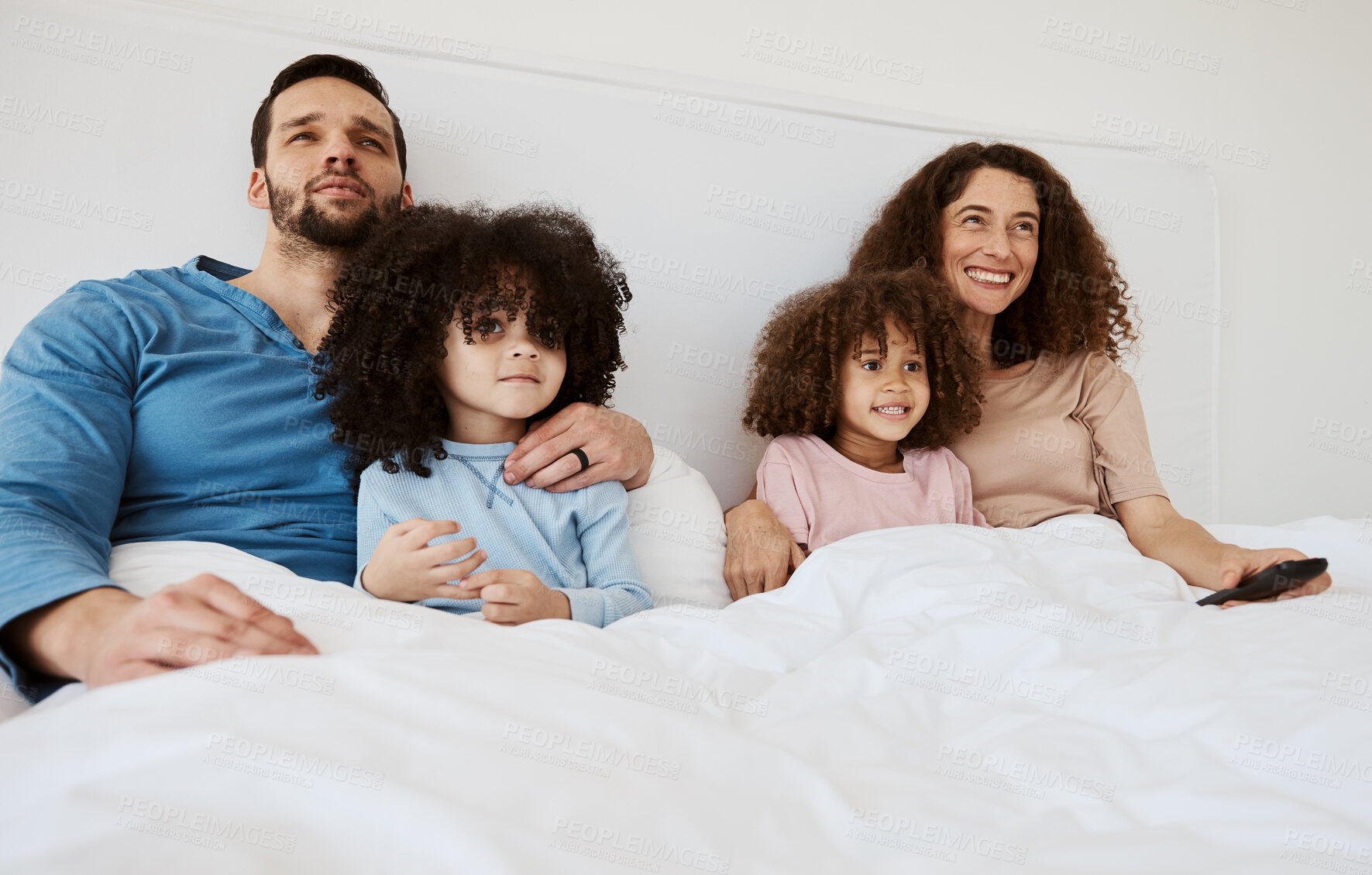 Buy stock photo Bedroom, kids and parents watch television series, subscription movies or streaming morning video, media or entertainment. Home bed, relax family or happy mother, father and children watching tv show