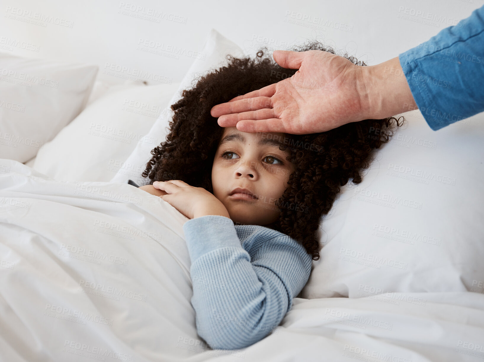 Buy stock photo Sick, child and hand on head check for temperature, fever and disease in a bed with headache. Bedroom, tired and fatigue of a young kid with healthcare and flu problem with parent support and monitor