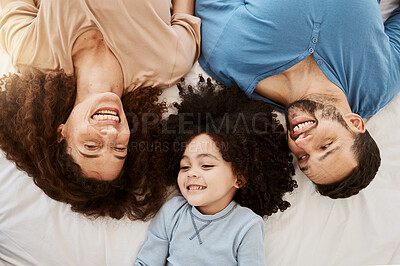 Buy stock photo Bedroom top view, kid and happy family love, bond and enjoy wellness, rest or quality time with mama, papa or parents. Home bed, morning closeup and face of mom, dad and young child relax on mattress