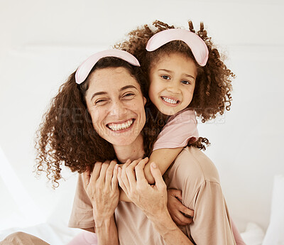 Mother, daughter and sleep mask, portrait and bonding with love, care and happy in the morning. Woman, young girl and hug at home with pajamas and family, positivity and fun together in bedroom