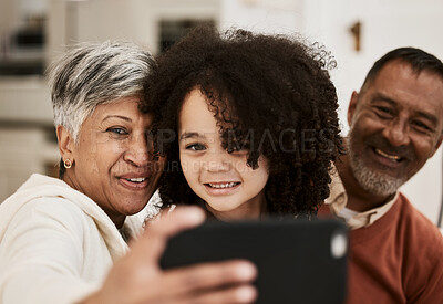 Buy stock photo Selfie, grandparents and face of happy family child, grandma and grandfather happiness, care and babysitting. Photography, home smile and senior people post memory photo of young kid to social media