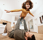 Father, child and airplane game on floor in home living room, bonding and love for care, relax or smile. Dad, girl kid or lift for plane, playing or happy on lounge carpet, portrait and family house