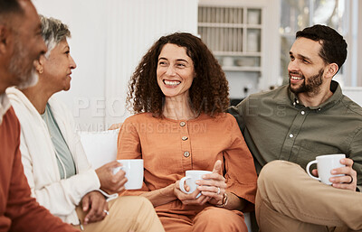 Buy stock photo Couple, senior parents and coffee on sofa, relax and happy with conversation, love and bonding in living room. Men, women and chat with matcha, espresso or tea for care, lounge couch and family home