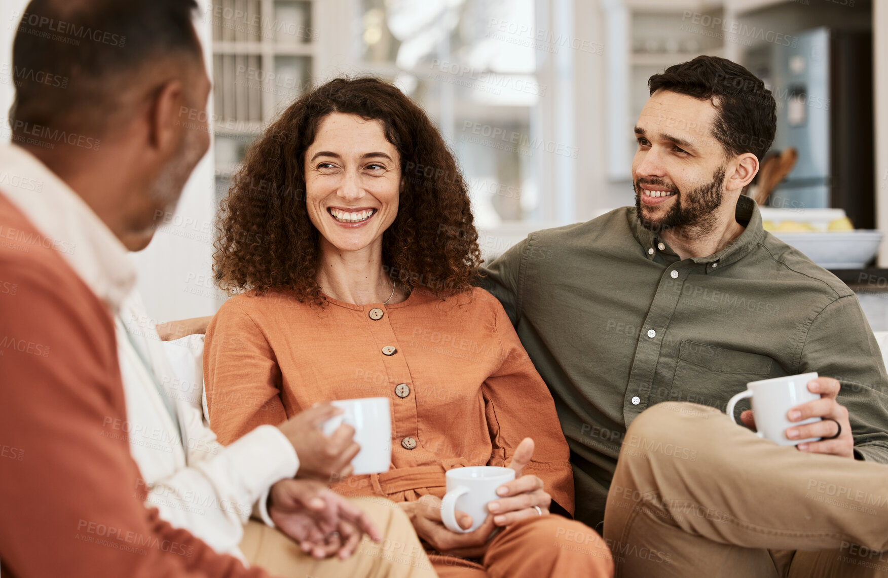 Buy stock photo Couple, senior parents and coffee in home, relax and happy with conversation, love and bonding in living room. Men, women and chat with matcha, espresso or tea for care, lounge couch and family house