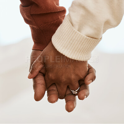 Buy stock photo Closeup, love and a couple holding hands for support, marriage trust and gratitude. Respect, comfort and a man and woman with affection, care or a gesture for romance together in a relationship