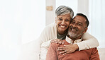 Portrait, smile and senior couple in home living room, bonding together and hug on mockup space. Happy face, man and Indian woman in lounge for care, love or support in healthy relationship at house