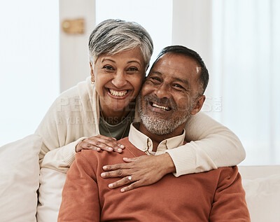 Buy stock photo Smile, portrait and senior couple hug on sofa in living room relax, laugh and bond in their home. Face, smile and old man embrace elderly woman in a lounge with love, satisfied and enjoy retirement