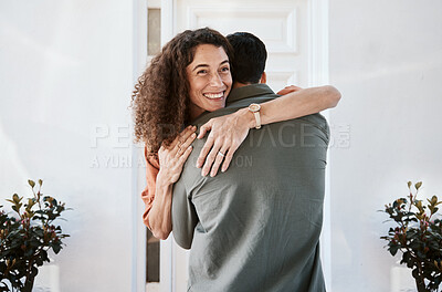 Buy stock photo Smile, love and a couple hugging in their home for support, care or romance in marriage together. Happy, trust and security with a woman embracing her husband in their house for relationship bonding