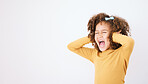 Screaming, loud and mockup with a girl child in studio on a white background covering her ears. Children, sound and audio with a young kid shouting or yelling on empty space for ADHD or autism