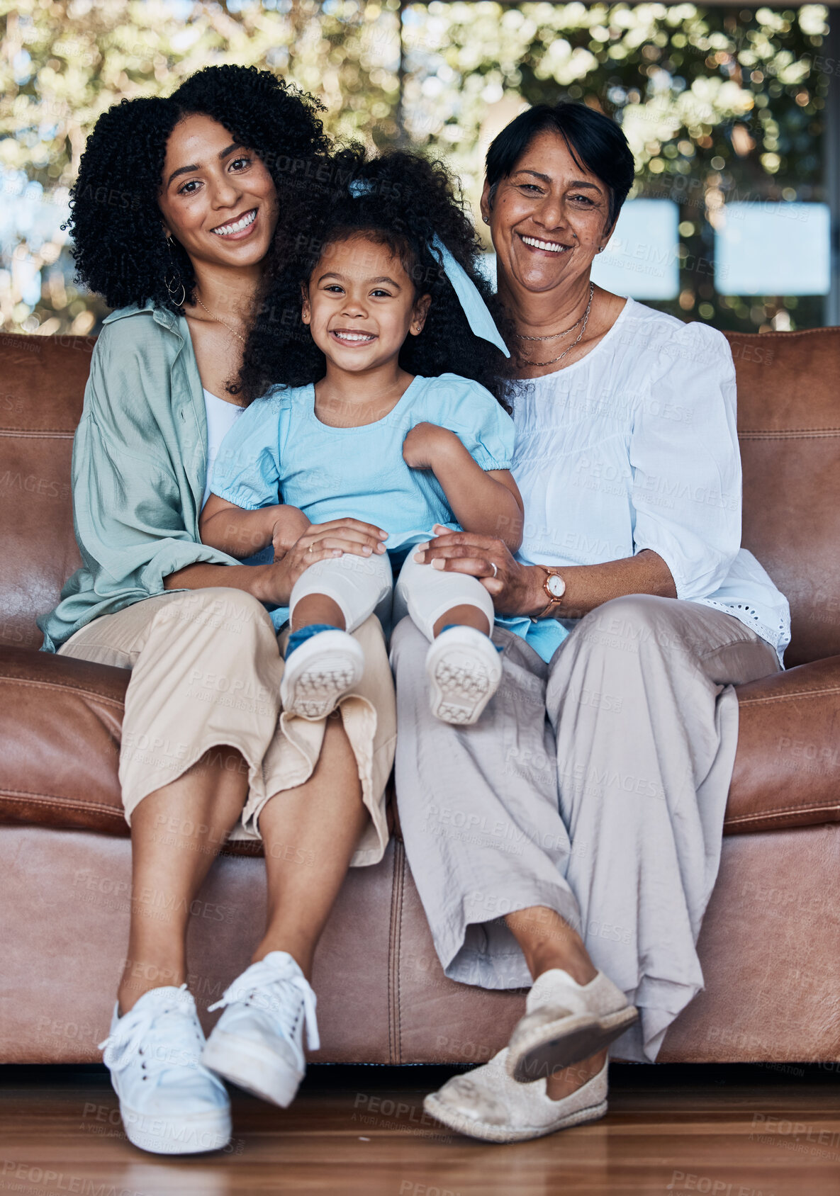 Buy stock photo Grandma, mother and daughter on sofa, portrait and smile with care, love and bonding in family house. Mom, grandmother and child with generations, embrace and happy for memory, living room and house