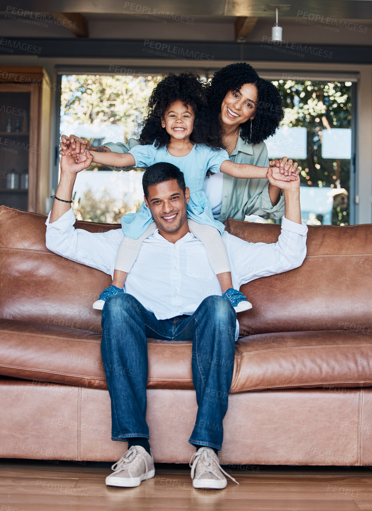 Buy stock photo Relax, airplane and portrait with family on sofa for happy, bonding or peace on holiday. Love, care and playful with parents and child in living room at home for vacation, cuddle and embrace together