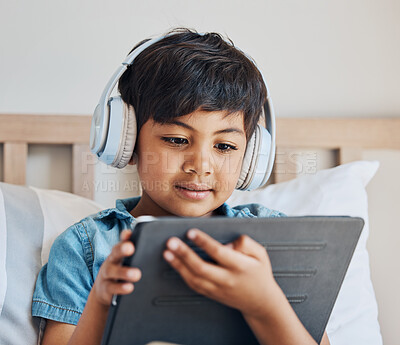 Premium Photo  Boy kid and headphones with tablet on bed for online games  watching movies or play educational app happy child digital technology or  listening to multimedia music or streaming cartoon