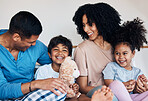 Smile, love and children with their parents on a bed for bonding, connection or playing with toys. Happy, teddy bear and family from Colombia talking and relaxing in the room of their modern house.