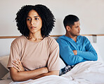 Frustrated couple, fight and conflict in breakup, argument or disagreement on bed from dispute at home. Upset woman and man in divorce, cheating affair or toxic relationship in bedroom at the house