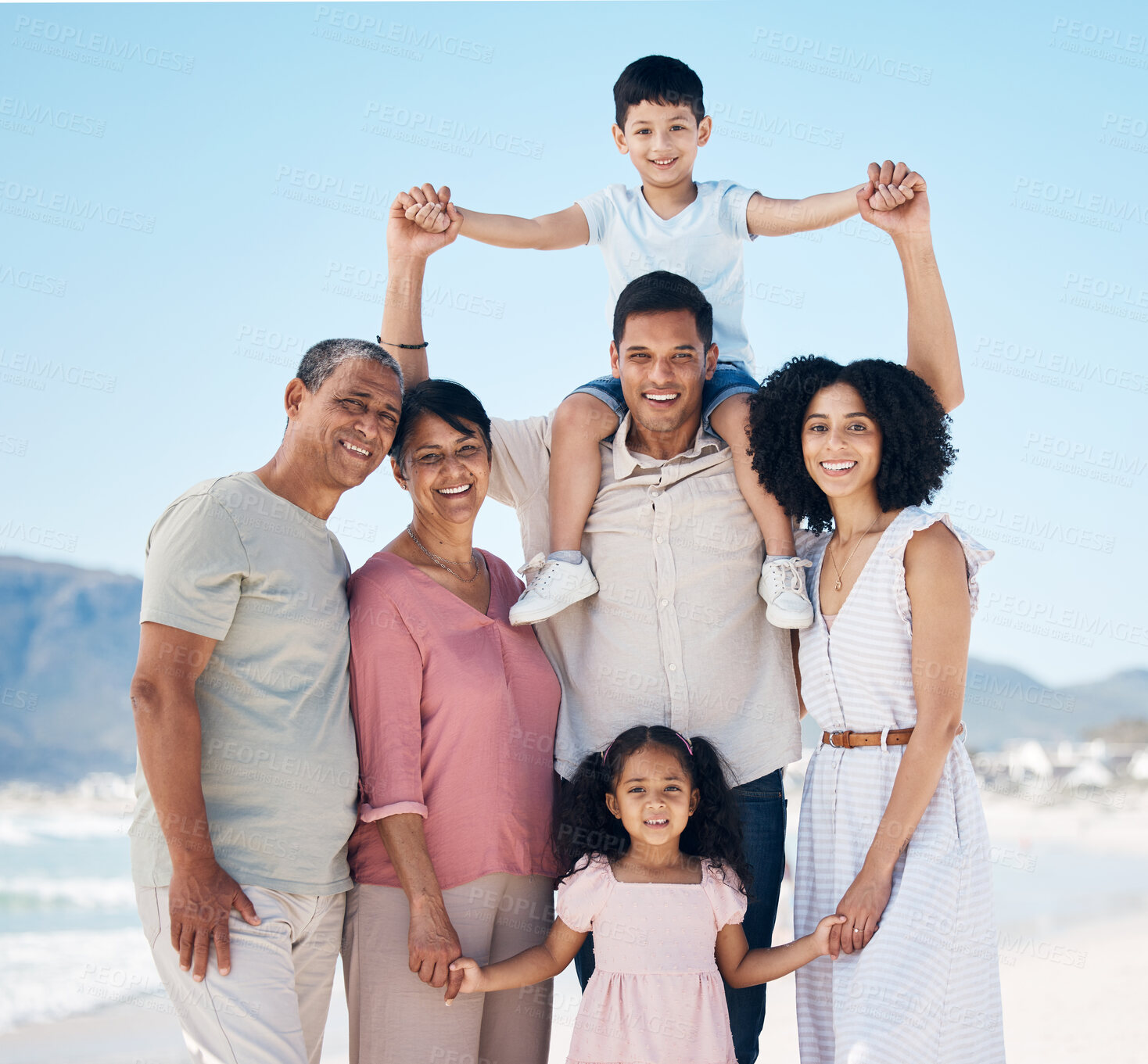 Buy stock photo Beach, portrait and parents, grandparents and children together with smile, love and blue sky on summer holiday in Mexico. Happy family, men and women with kids on ocean holiday travel in nature.