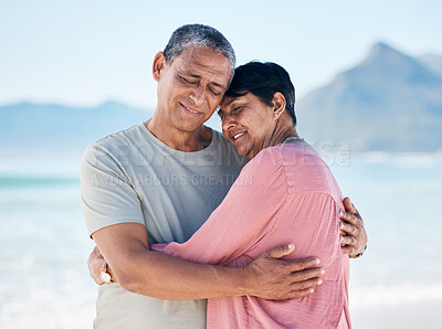 Buy stock photo Mature couple, love and hug outdoor at beach with a smile, care and happiness together in nature. A happy man and woman for healthy marriage, commitment and freedom on travel, holiday or vacation