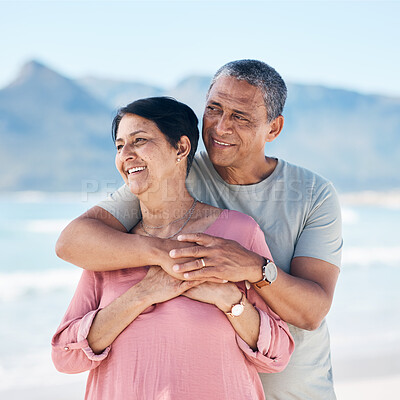 Buy stock photo Love, hug and mature couple outdoor with a smile, care and happiness together in nature. A happy man and woman for healthy marriage, commitment and freedom on travel, beach holiday or vacation