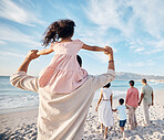 Big family, holiday and walking on beach together, piggy back and holding hands on summer island sand from behind. Parents, grandparents and kids adventure on tropical vacation at ocean in Hawaii.