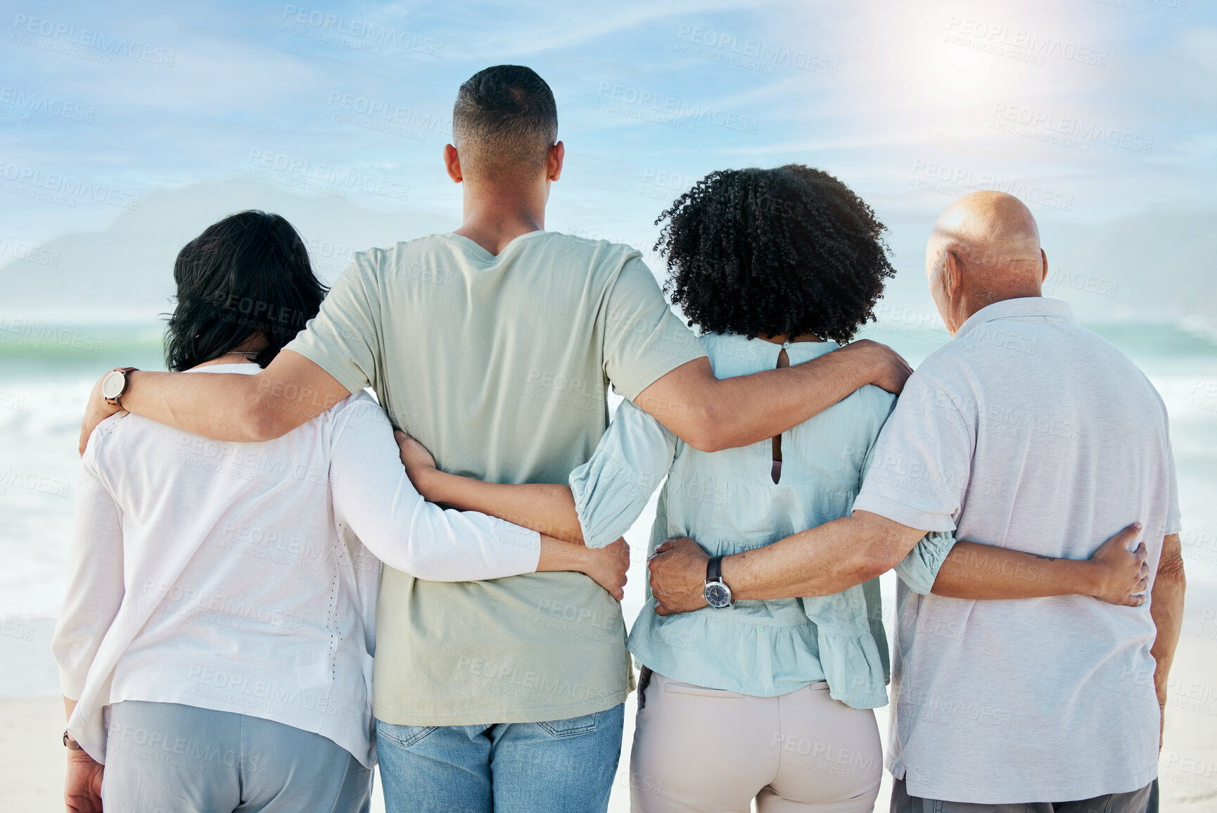 Buy stock photo Back, hug and family at the beach for the view, ocean vacation and love in summer. Calm, nature and senior people with a man and woman for care and support in travel at the sea for a holiday together