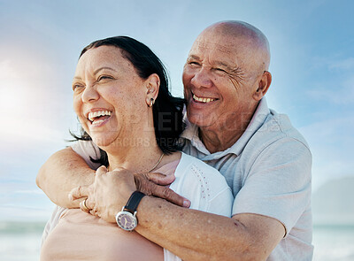 Buy stock photo Hug, happy and thinking couple at beach for travel, vacation and at the ocean together. Smile, love and a senior man and woman with care and an idea at the sea in the morning, laughing and on a date