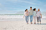 Love, mockup and a family walking on the beach together for summer vacation or holiday in nature. Sky, freedom and travel with senior people, son or daughter outdoor for summer bonding by the ocean