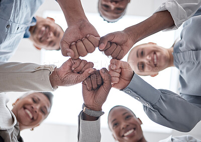 Buy stock photo Hands fist bump, group circle and business people celebrate community support, synergy or happy corporate achievement. Below view, trust and staff commitment, solidarity and team building motivation