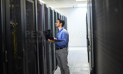 Buy stock photo Man, engineering laptop and server room, data center inspection or system solution for cybersecurity coding. IT person on computer for cables check, business power or programming hardware in basement