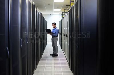 Buy stock photo Server room, laptop or man typing for cybersecurity glitch, machine or to search online for servers system. IT support, data center or engineer fixing network for information technology solution