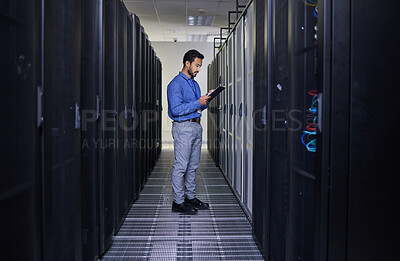 Buy stock photo Tablet, man and engineer in server room, research and programming. Information technology, reading and technician in data center, network on cybersecurity and coding software of system admin typing