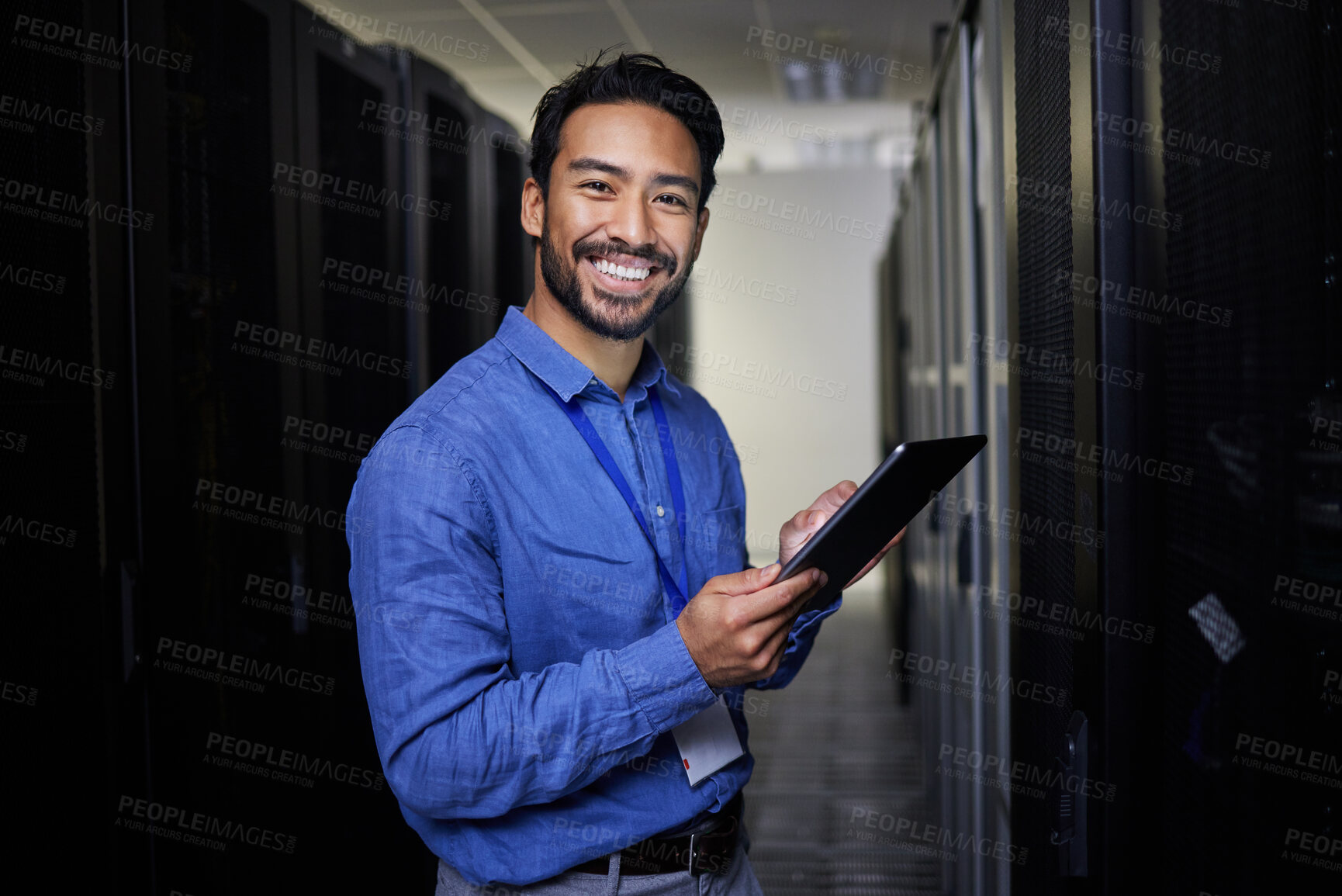 Buy stock photo Tablet, man and portrait in server room of engineer programming at night. Information technology, face and happy Asian technician in data center, networking and coding software of system admin expert