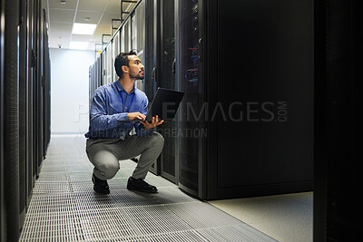 Buy stock photo Server room, laptop or man typing for cybersecurity glitch, machine or to search online on servers system. IT support, data center or male engineer fixing network for information technology solution