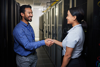 Buy stock photo Handshake, partnership or happy people in server room of data center for network help with IT support. B2b deal agreement, teamwork or engineers shaking hands together in collaboration for solution