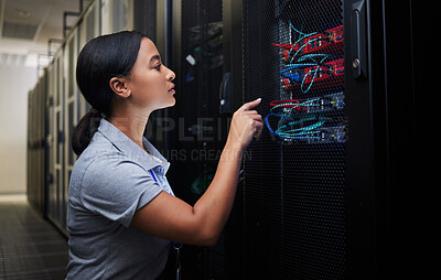 Buy stock photo Woman, cable and engineer in server room to check inspection of cloud computing. Information technology, wire and technician in data center, networking in maintenance or cybersecurity of system admin