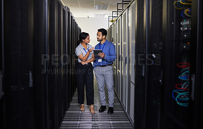Buy stock photo Talking, people and technician in server room with tablet for cybersecurity, update or team problem solving in data or coding. Engineer, teamwork and working with error in information technology code