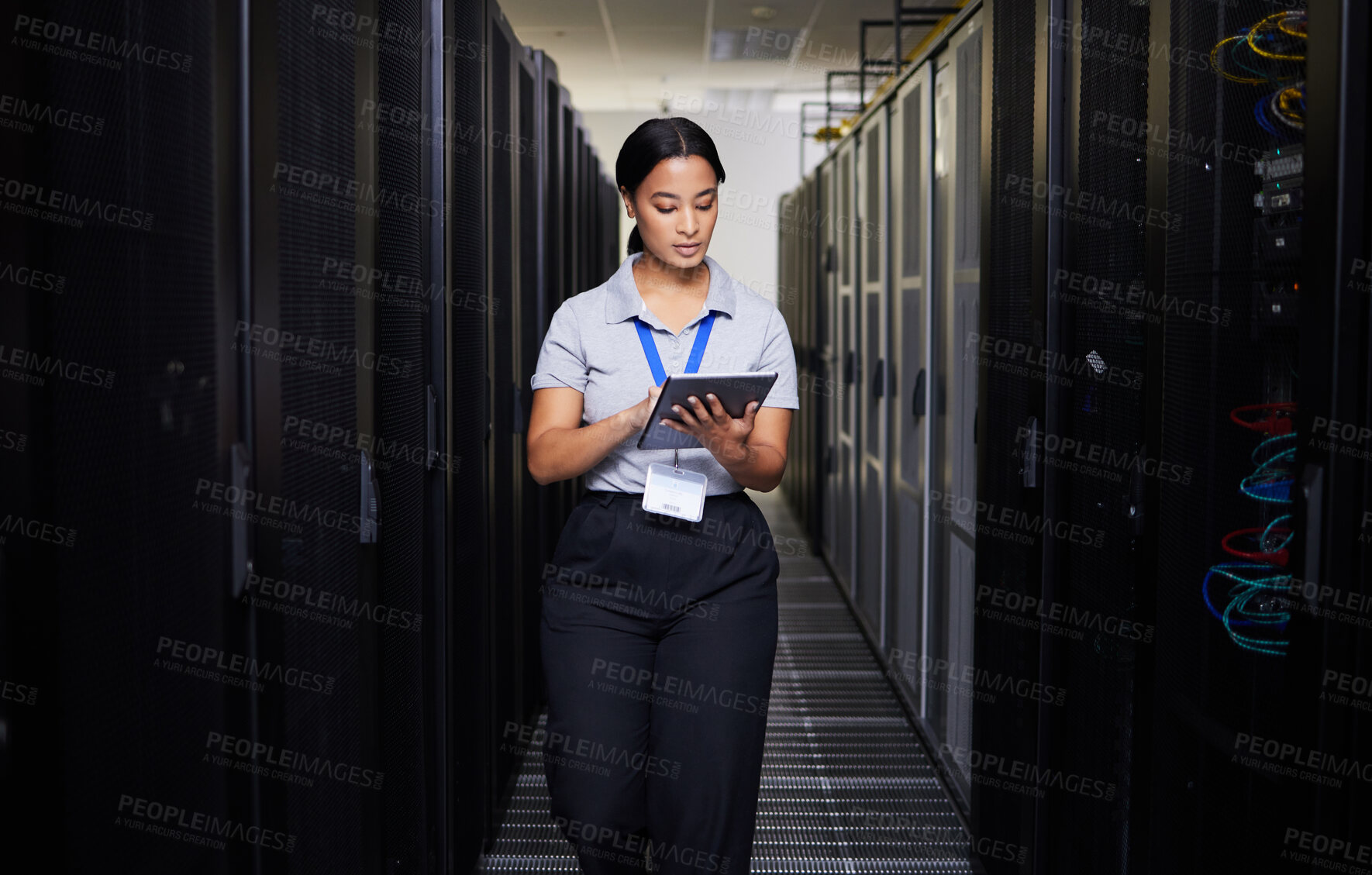 Buy stock photo Woman, tablet and engineer in server room on research for programming at night. Information technology, inspection and technician in data center reading, network maintenance or typing software code