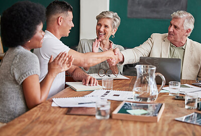 Buy stock photo Applause, promotion and bonus with business people shaking hands in an office during a meeting. Success, motivation and handshake for support, partnership or thank you in the company boardroom