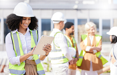 Buy stock photo Tablet, architecture and a black woman construction worker on a building site with her team in the city. Technology, planning and safety with a female designer reading a blueprint on the internet