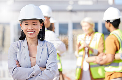 Buy stock photo Construction worker, architecture and Asian woman on engineering site with team or designers for property renovation. Portrait, professional and arms crossed of project leader for building inspection
