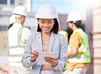 Tablet, woman in engineering and architect on construction site with group of building engineers for teamwork planning, inspection and property renovation. Smile, person and project leader for repair