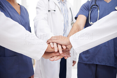 Buy stock photo Doctor, teamwork and hands together in meeting, motivation or unity in healthcare mission together at hospital. Closeup of professional medical group piling in team building, support or clinic goals