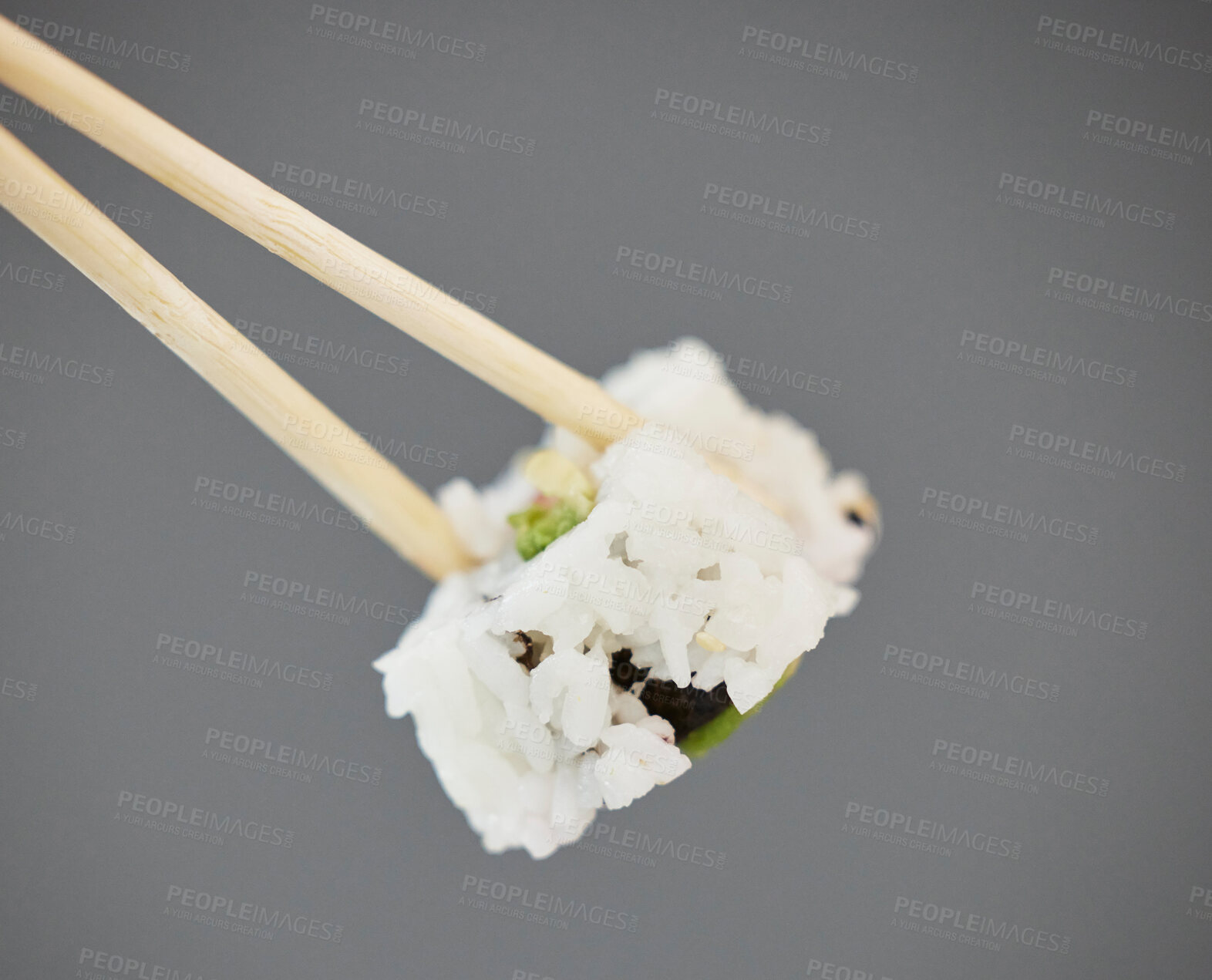 Buy stock photo Seafood, sushi and chopsticks on studio background, California roll with seaweed for healthy Asian dining promo. Japanese food culture with rice, raw fish and avocado, restaurant menu offer or deal.