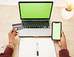 Woman, hands and laptop with phone mockup and credit card in green screen, online shopping or banking at office. Female person with debit on computer or smartphone app display in ecommerce or fintech