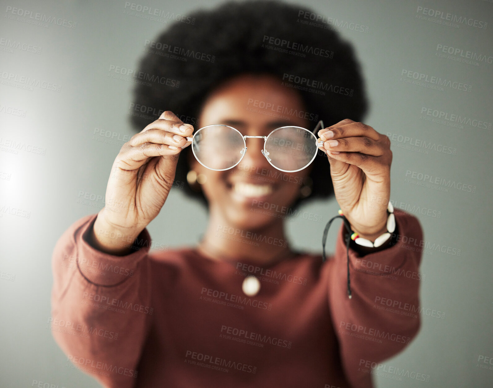 Buy stock photo Hands, woman and closeup of glasses for vision, eyesight and prescription eye care in studio. Person with optical frame, lens choice and eyewear fashion for test, healthcare assessment and optometry 