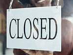 Closed, sign and window of a coffee shop closeup for small business commerce or service in the food and beverage industry. Cafe, glass and poster for retail or hospitality at a startup restaurant