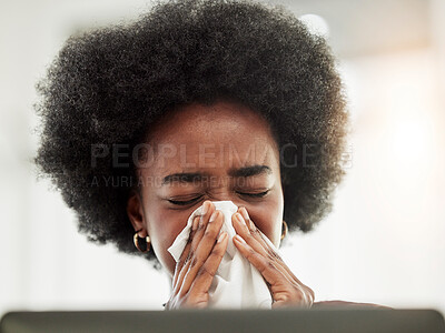Buy stock photo Allergies, sneeze and sick black woman blowing nose in home office with allergies, flu or cold in her home. Tissue, paper and African female freelancer with virus, hayfever or covid working on laptop